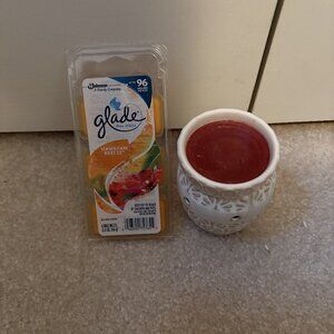 ITEM NO. 9: Candle in jar.